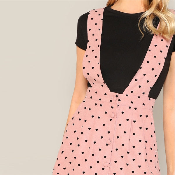 Pink Allover Heart Print Pocket Side Pinafore Button Strap Mini Dress